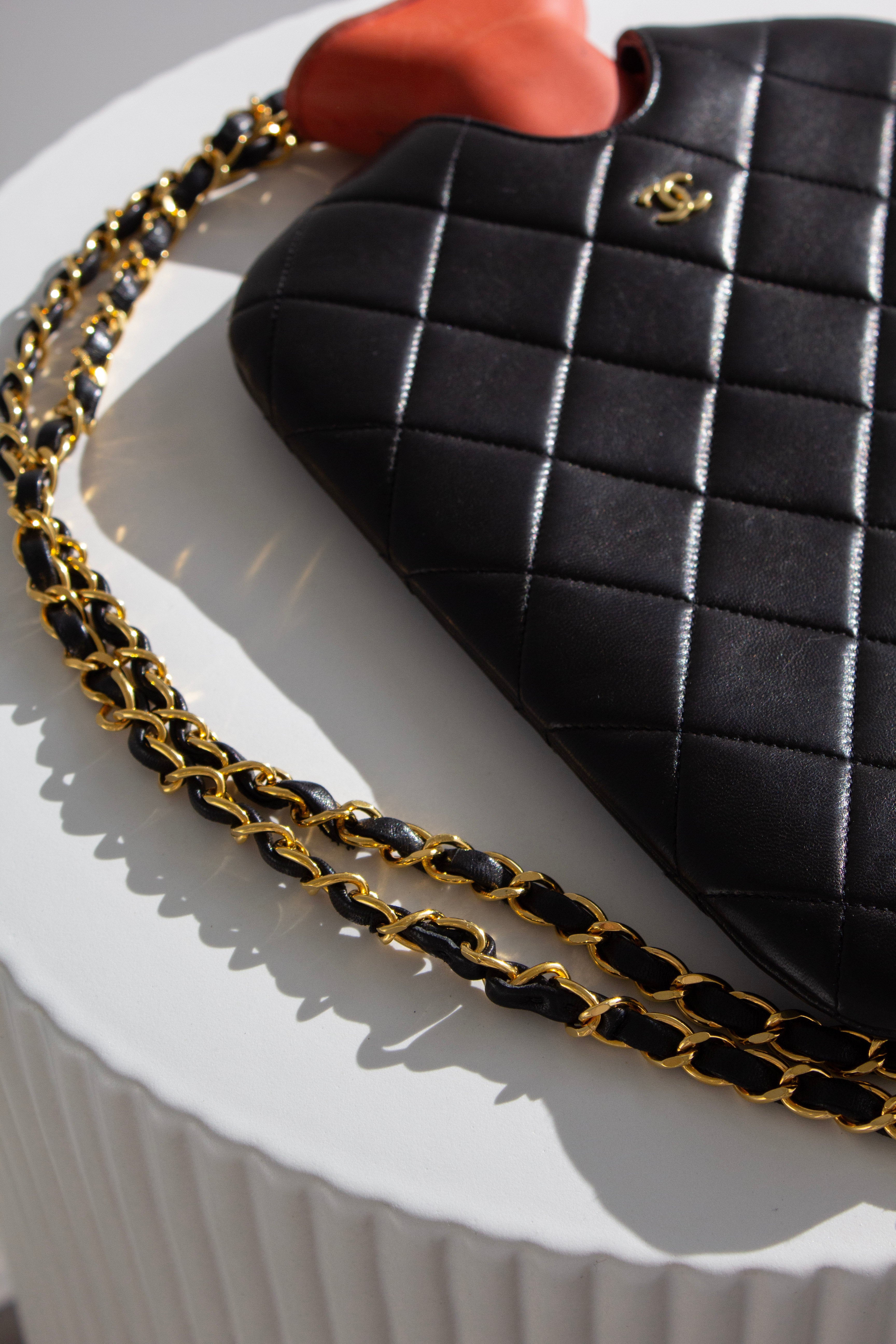 Chanel Fall/Winter 1993 Black Quilted Lambskin Red 24K Gold-Plated Hot Water Bottle