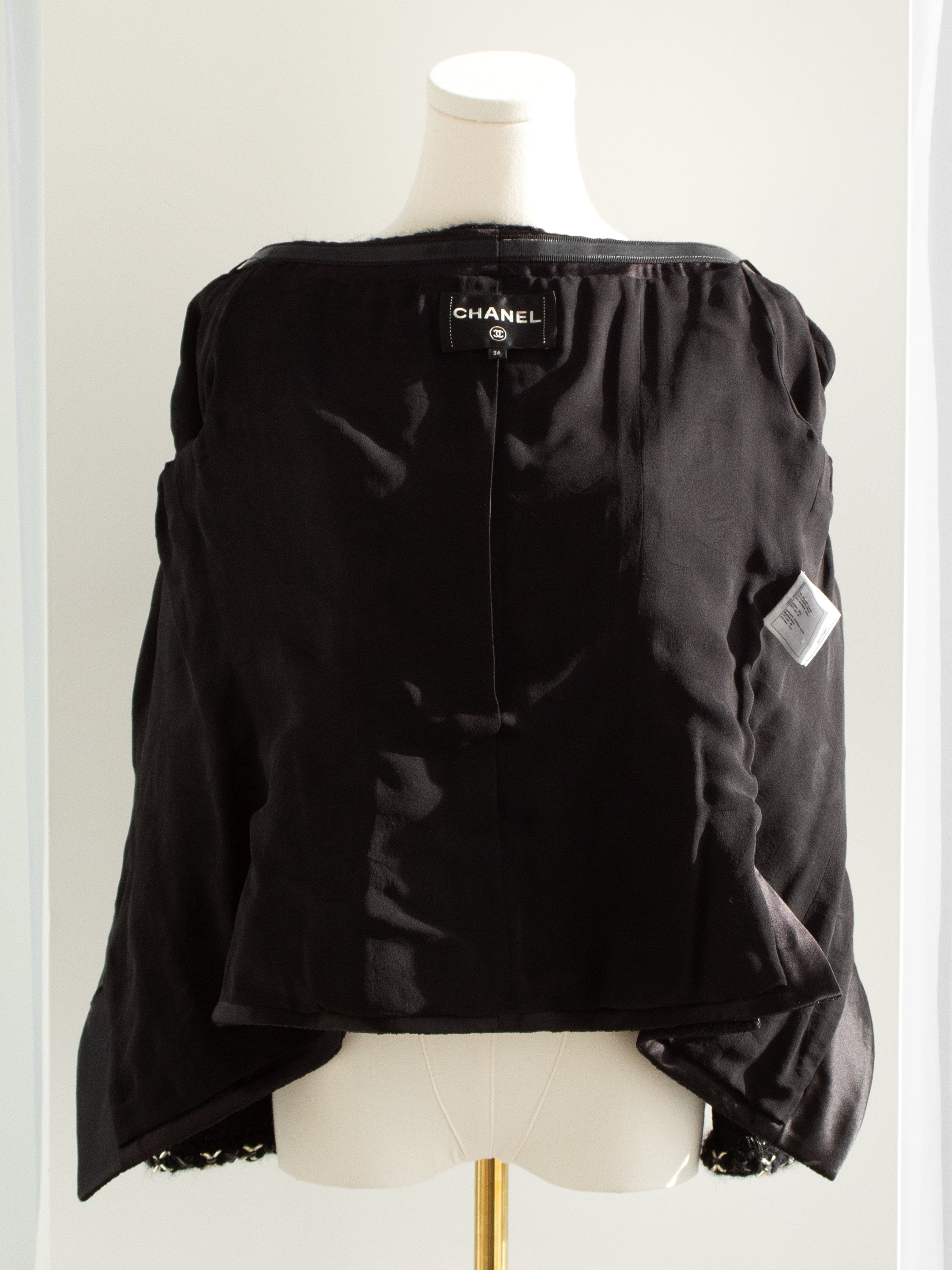 Chanel F/W 2021 Metiers D'Art Chateau Des Dames Black Off-Shoulder 21A Jacket