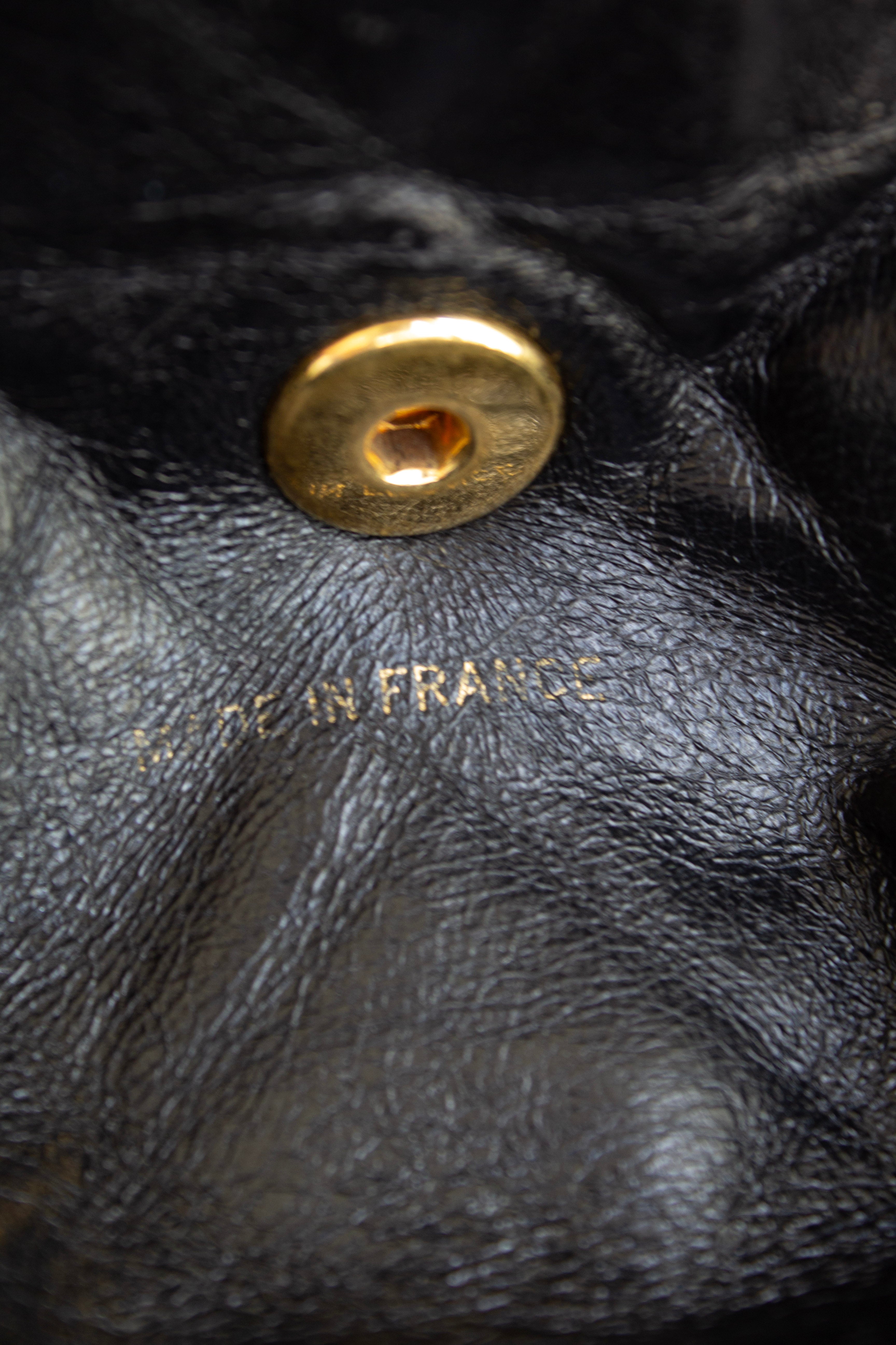 Chanel Vintage Duma Black Lambskin Leather Quilted 24K Gold Backpack