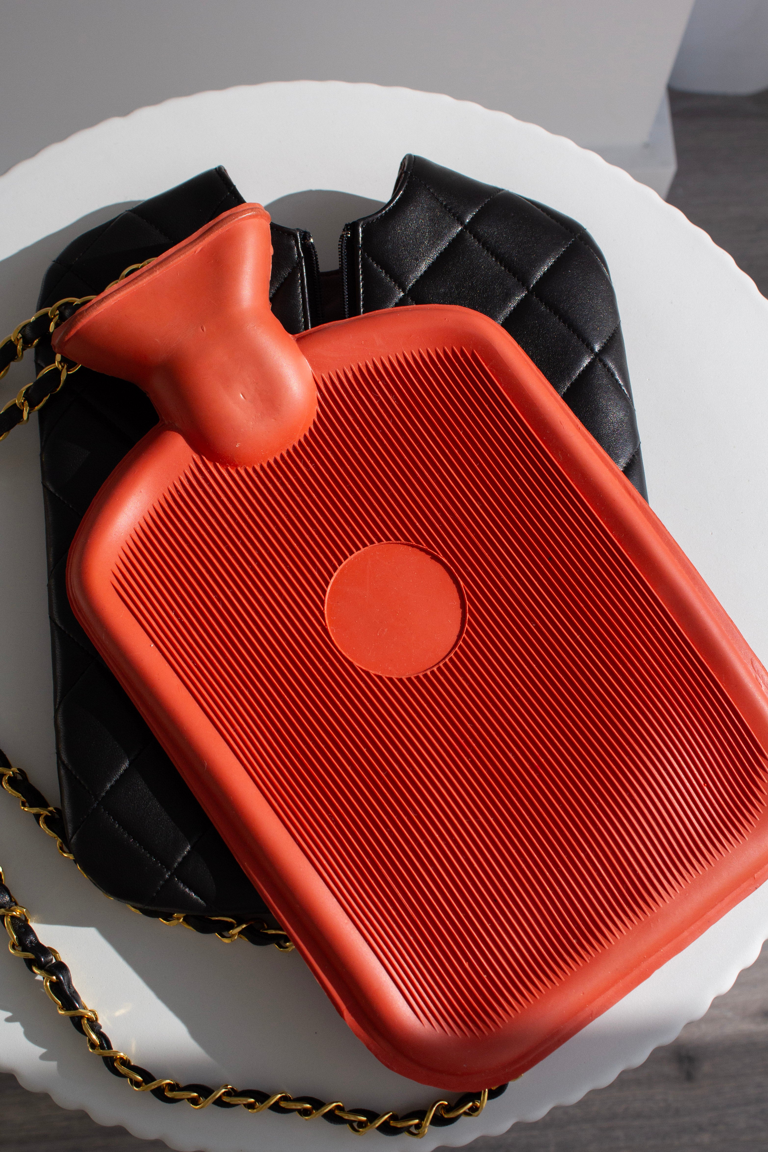Chanel Fall/Winter 1993 Black Quilted Lambskin Red 24K Gold-Plated Hot Water Bottle